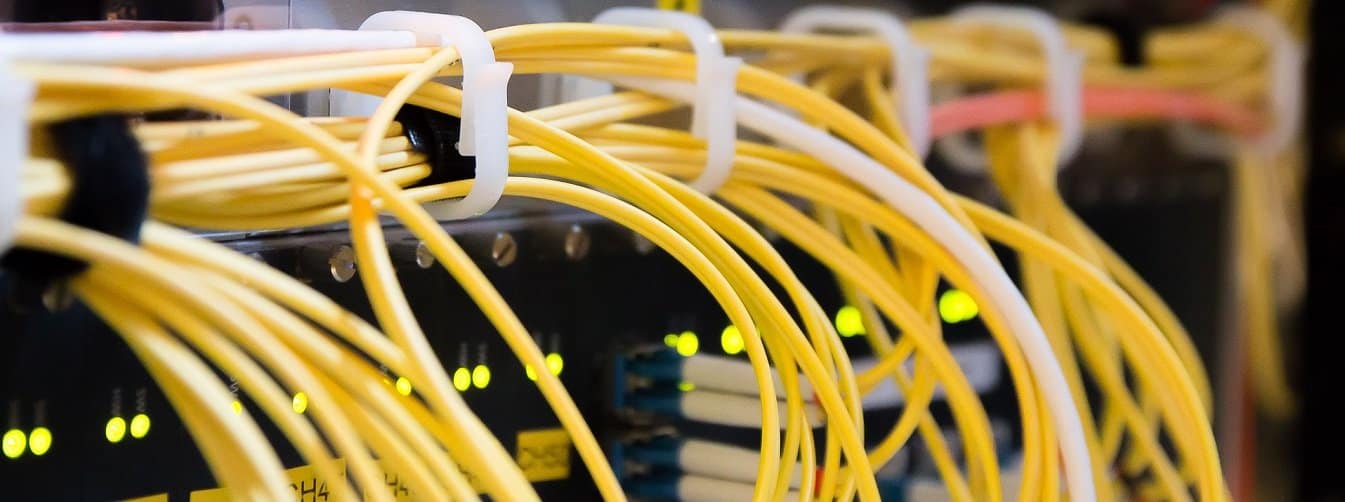 Network cabling connected to telecoms hardware supporting LAN connectivity