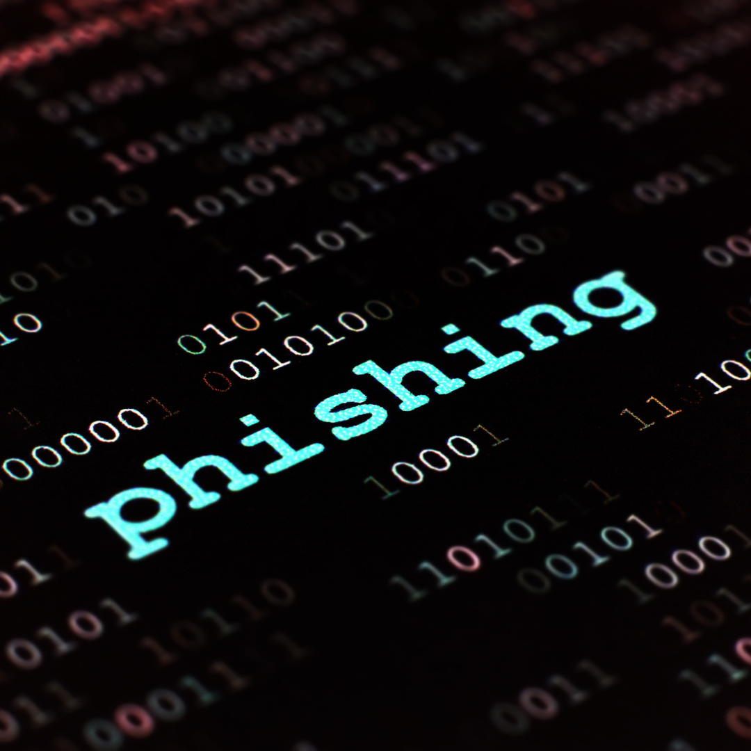 Close-up of binary code with the word “phishing” highlighted, representing phishing attacks and online cyber security threats.
