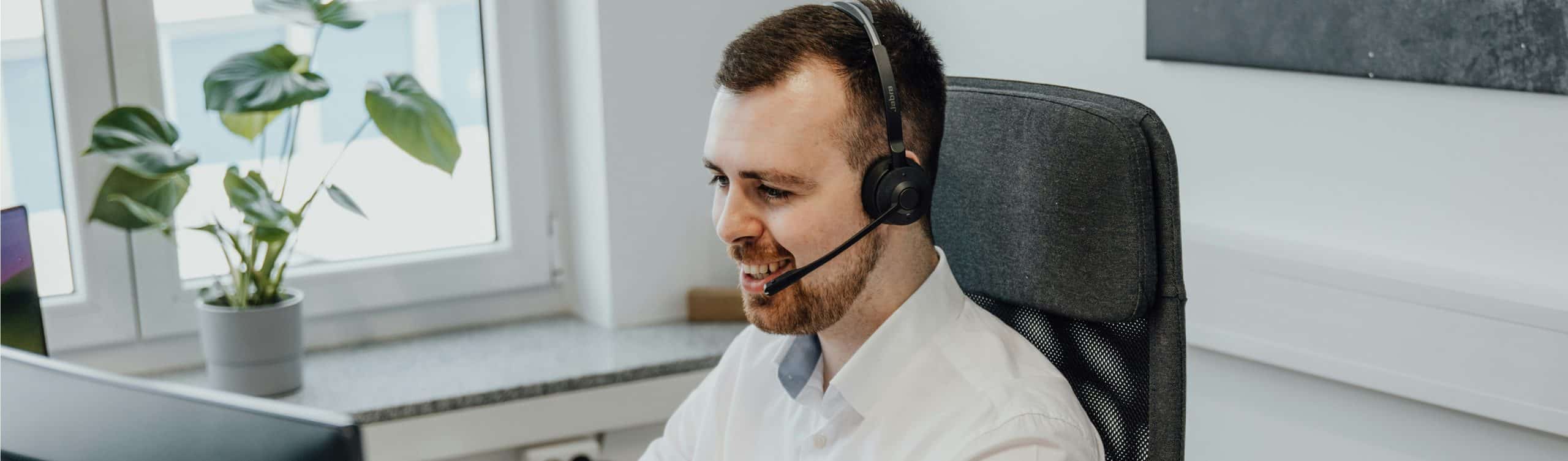 Man At desk|data|IT support man working at desk
