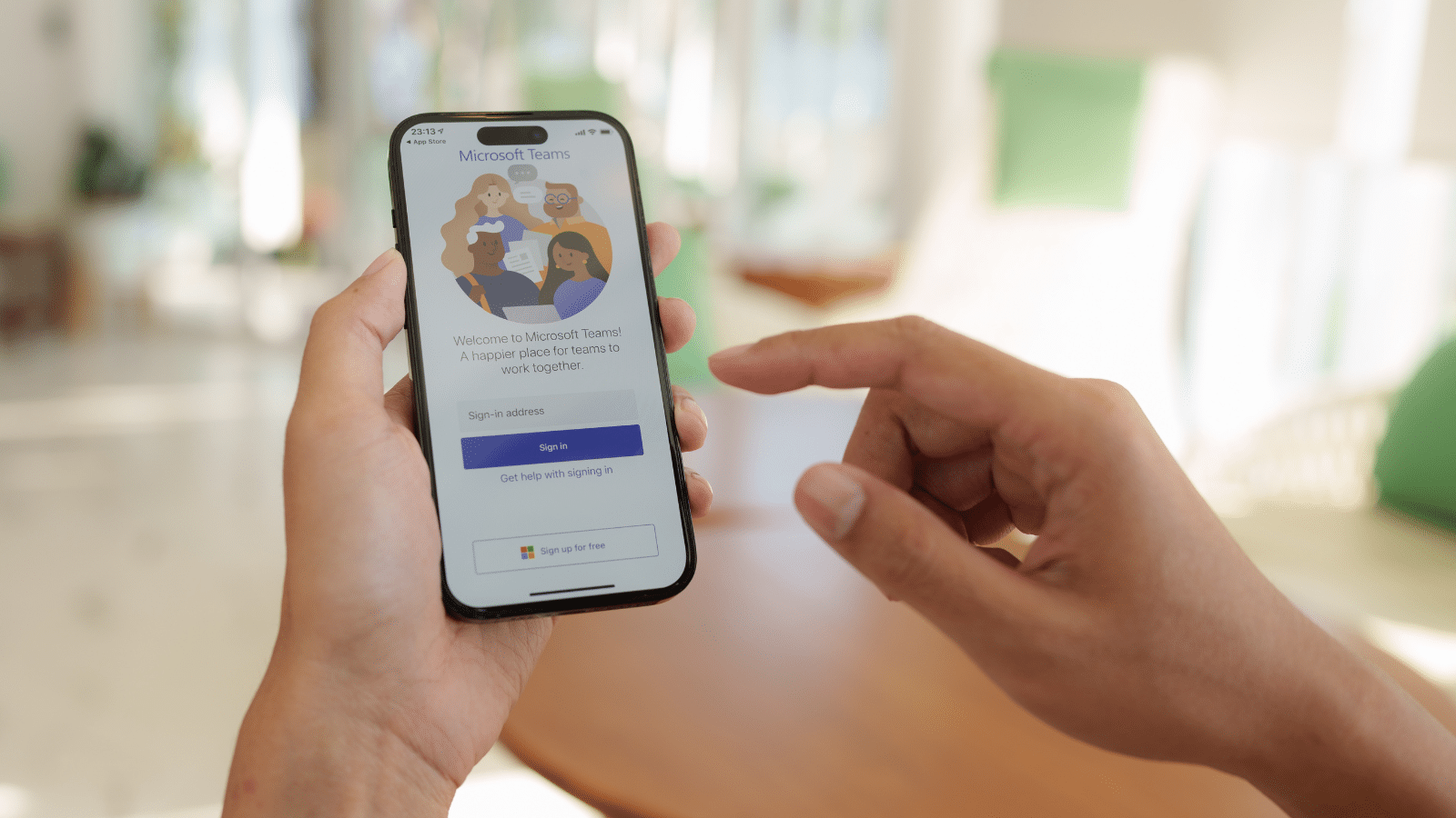 Employee using Microsoft Teams mobile app for business calls and remote working